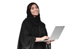Arab abaya woman using laptop. Arabian muslim businesswoman working.