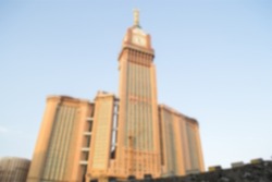 Clock tower in mecca in blurry view