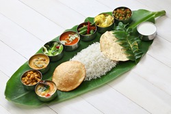 meals served on banana leaf, traditional south indian cuisine