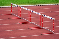 Hurdles set up on an athletics track, for a hurdle jumping race