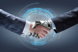 Businessman and robot's handshake with holographic Earth globe on background. Artificial intelligence technology