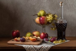 Still life with fruit. Apples Grapes Pears and Plums.