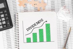 Notebook with Toolls and Notes about Dividends.