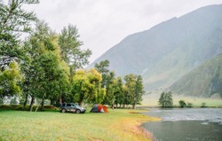 camping on the river bank