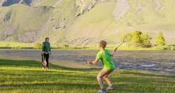 people play in badminton outdoors
