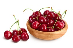 red sweet cherry in wooden bowl isolated on white background with clipping path and full depth of field