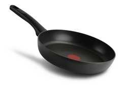 black frying pan with a non-stick coating isolated on white background with clipping path and full depth of field