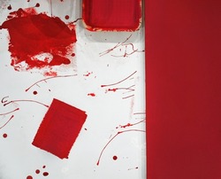 abstract background with traces of red paint on a white background