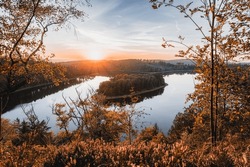 Lake and island with trees. Sunset over Sec Dam.Water reservoir Sec, Czech Republic, Europe