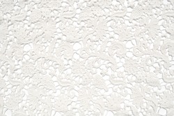 The texture of lace on a white background