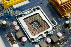 close view at empty processor socket on computer motherboard