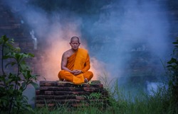 Buddhist Monk Meditation. Wat Choeng Tha is an ancient temple built in the Ayutthaya period.