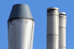 Chimney stacks in an industrial zone.