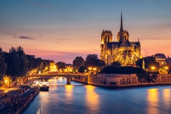 Notre Dame cathedral at sunset, France. Notre Dame de Paris, most beautiful Cathedral in Paris. Picturesque sunset over Cathedral of Notre Dame de Paris, destroyed in a fire in 2019, Paris.