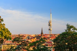 Panoramic view of Prague with red roofs and Zizkov television tower in the background, Prague, Czech republic