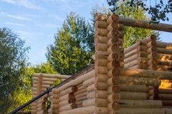 Building wooden cottage of balk wall