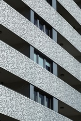 Modern building facade. Perspective view. Dots pattern on the modern residential building.