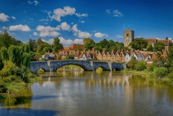 The Church and Bridge over the river Medway at high tide at Aylesford Village in Kent England at High Tide 