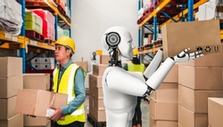 Innovative industry robot working in warehouse together with human worker . Concept of artificial intelligence for industrial revolution and automation manufacturing process .