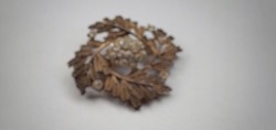 Defocused abstract background of antique brooch to beautify the hijab