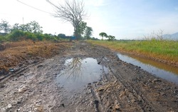 Puddles on the road, Puddles after the rain, Mud roads are damaged and waterlogged
