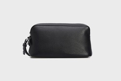 Black classic unisex men's women's Cosmetic Case Wallet Purse Pouch. Leather Bag for wan woman isolated on white background in front, mock up