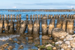 Wooden groyne on the Baltic Sea coast, long exposure