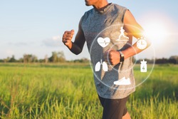 Running man with smart watch. Concept of The technology to check health while exercising.