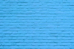 Background of a blue painted brick wall cladding 