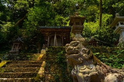 Ancient shrine in the mountains covered with moss
