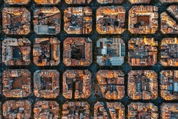 Aerial view of typical buildings of Barcelona cityscape. Eixample residential famous urban grid. Catalonia, Spain