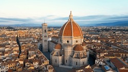 Aerial view of Florence Cathedral (Duomo di Firenze), Cathedral of Saint Mary of the Flower, sunset golden hour, Italy