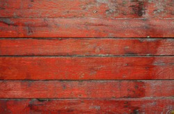 painted old wooden wall. red background