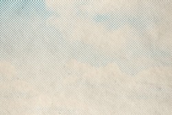 retro sky pattern on old paper texture. raster halftone vintage clouds.