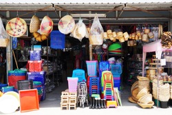 Miscellaneous street shop. Traditional of store front of miscellaneous shop that selling cooking stuff, cleaning tools, plastic chairs and household items for street food hawkers and houses. Thailand.