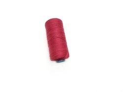 Maroon thread on a white background