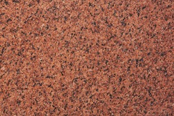 Dark red granite patterned texture or background. natural marble 