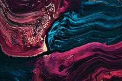 Fluid Art. Beautiful blue and purple waves with with liquid gold curls. Marble effect background or texture