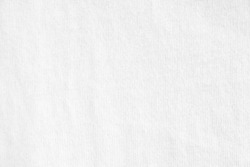 Closeup white crumpled textile texture background. Horizontal picture.