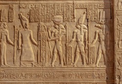 Egyptian gods engraved on the wall of the temple of Sobek, Kom Ombo Island