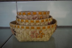 Beka, a woven bowl or plate made of palm leaf used by one of Flores tribe, Ngada. The color of the decoration is natural dye colors.