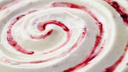 Texture of yogurt with blueberry jam, curd cream swirl with berry topping