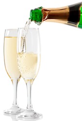 Champagne is poured into two glasses