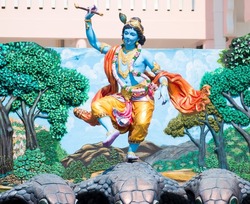 Idol of Lord Krishna dancing on the heads of Snake. selective focus on subject