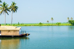 Beautiful blue backwater of alleppey or Alappuzha from House boat. selective focus and copy space.