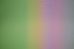 Background gradient from green, yellow and pink.