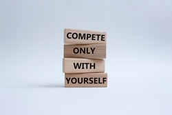 Compete only with yourself symbol. Concept words compete only with yourself on wooden blocks. Beautiful white background. Business and Compete only with yourself concept. Copy space. Conceptual image