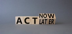 Act Now vs Act Later symbol. Turned cubes with words Act Now vs Act Later. Beautiful grey background. Business concept. Copy space
