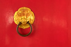 China red door with steel door knocker, this have space for text