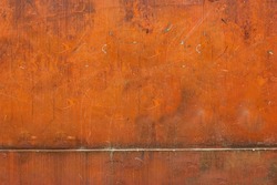 Orange wall with rough texture a place to make a mural